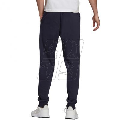 4. Spodnie adidas Essentials Fleece M H33664