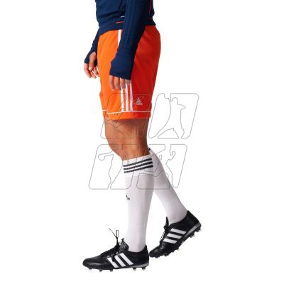 Spodenki piłkarskie adidas Squadra 17 M BJ9229 w kolorze pomarańczowym, posiadają technologię climalite