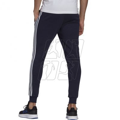 4. Spodnie adidas Essentials Slim 3 Stripes Pants M GM1090