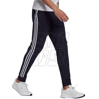 3. Spodnie adidas Essentials Fleece Tapered Cuff 3-Band M GK8823