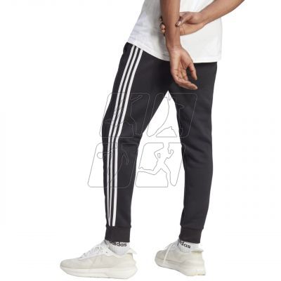 4. Spodnie adidas Essentials Fleece 3-Stripes Tapered Cuff M IB4030