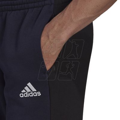 6. Spodnie adidas Essentials Colorblock Fleece M HK2884