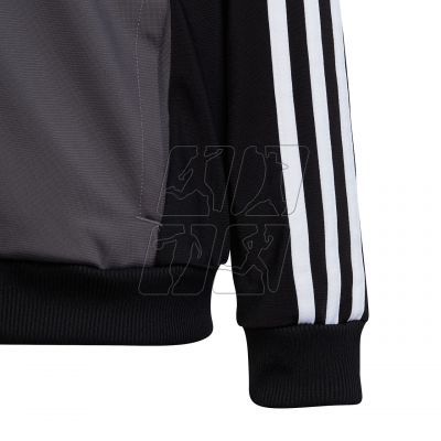 7. Dres adidas Essentials 3-Stripes Tiberio Track Suit Jr HR6406