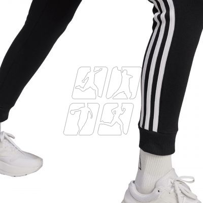 6. Spodnie adidas Essentials 3-Stripes Fleece W HZ5753