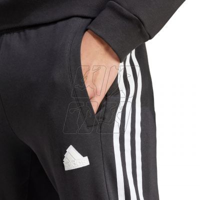 6. Spodnie adidas House of Tiro Fleece M IW0171