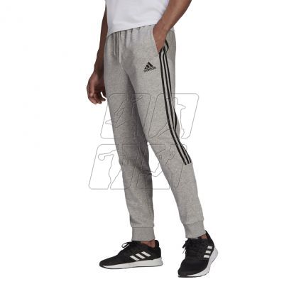 4. Spodnie adidas Essentials Tapered Cuff 3 Stripes M GK8976