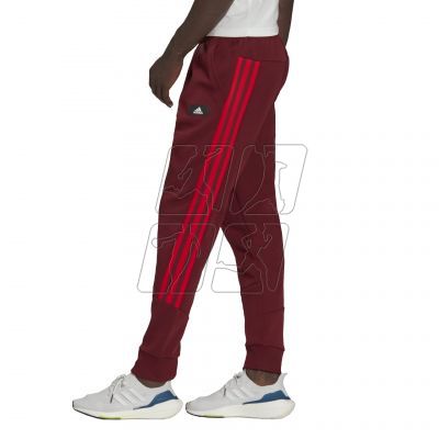 3. Spodnie adidas Sportswear Future Icons 3-Stripes Pants M HC5262