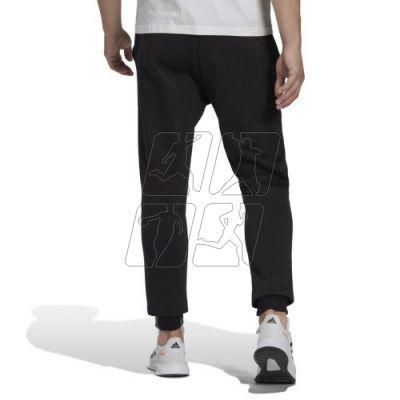 2. Spodnie adidas Feelcozy Pant M HL2236