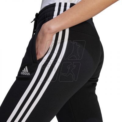 5. Spodnie adidas Essentials 3-Stripes Fleece W HZ5753
