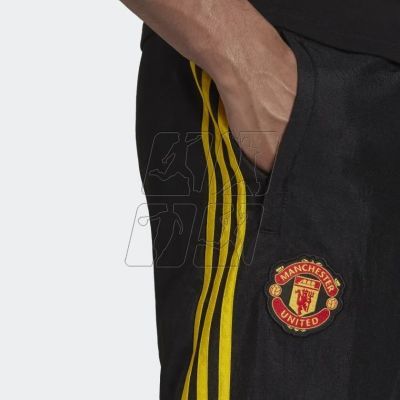 6. Spodnie adidas Manchester United F.C. Icon Woven Pant M GR3878