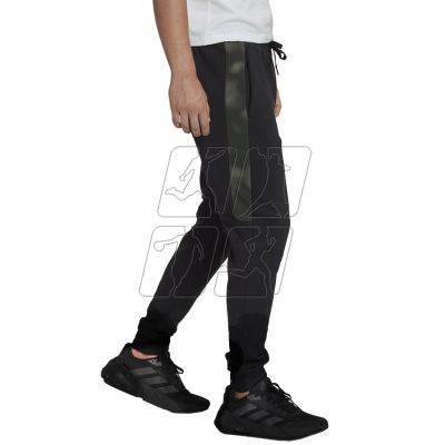 5. Spodnie adidas Essentials Camo Print Fleece Pant M HL6929