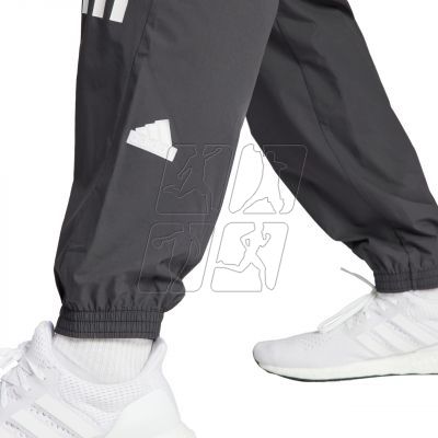 6. Spodnie adidas Future Icons 3S Woven M IN3318
