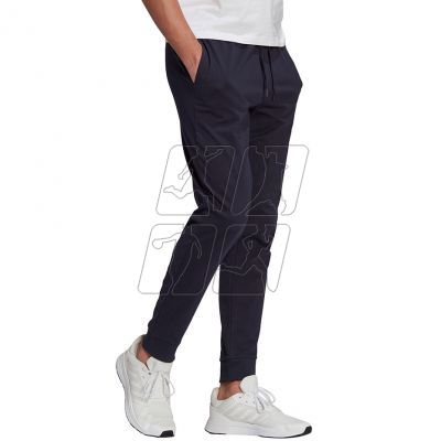 3. Spodnie adidas Essentials Single M GK9259