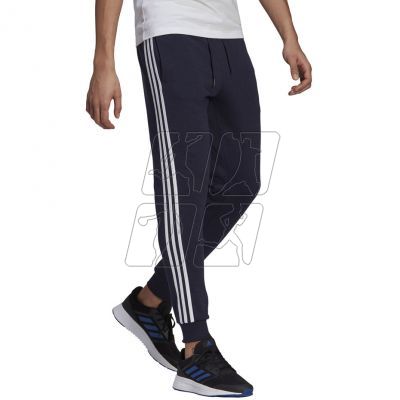 3. Spodnie adidas Essentials Slim 3 Stripes Pants M GM1090