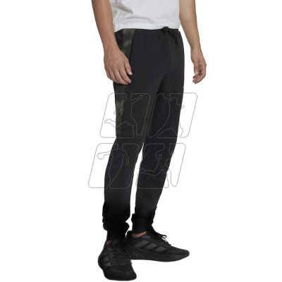 4. Spodnie adidas Essentials Camo Print Fleece Pant M HL6929