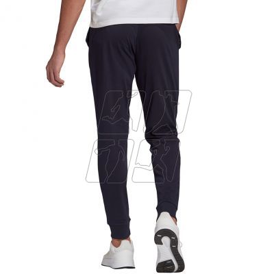 4. Spodnie adidas Essentials Single M GK9259