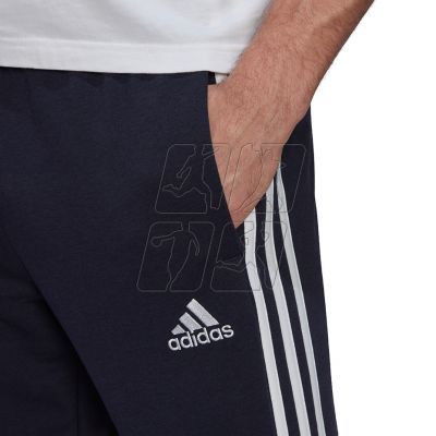 4. Spodnie adidas Essentials Tapered Elastic Cuff 3 Stripes Pant M GK8830