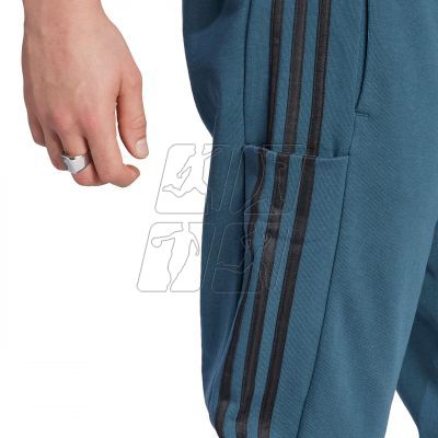 5. Spodnie adidas Essentials French Terry Tapered Cuff 3-Stripes Pants M IJ8698