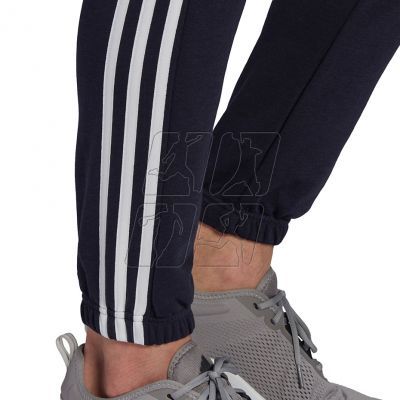6. Spodnie adidas Essentials Tapered Elastic Cuff 3 Stripes Pant M GK8830