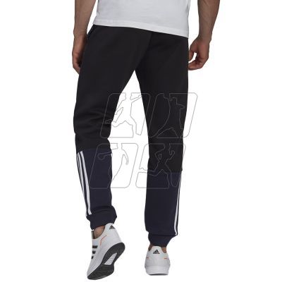 3. Spodnie adidas Essentials Colorblock Fleece M HK2884