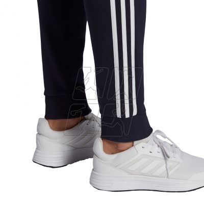 6. Spodnie adidas Essentials Fleece Tapered Cuff 3-Band M GK8823