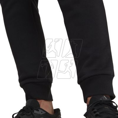 7. Spodnie adidas Essentials Camo Print Fleece Pant M HL6929