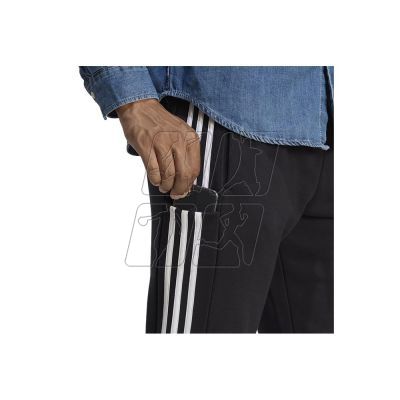 4. Spodnie adidas Essentials French Terry Tapered Cuff 3-Stripes M HA4337