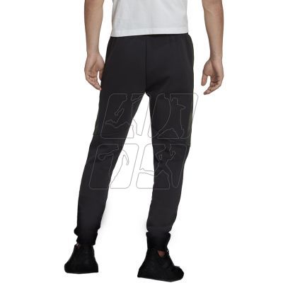 3. Spodnie adidas Essentials Camo Print Fleece Pant M HL6929