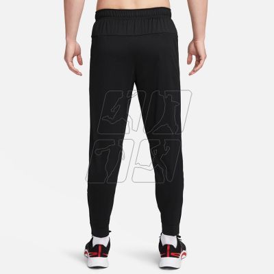 2. Spodnie Nike Totality M FB7509-010