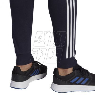 6. Spodnie adidas Essentials Slim 3 Stripes Pants M GM1090