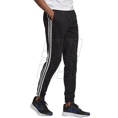 3. Spodnie adidas Essentials Tapered Elasticcuff 3 Stripes Pant M GK8822