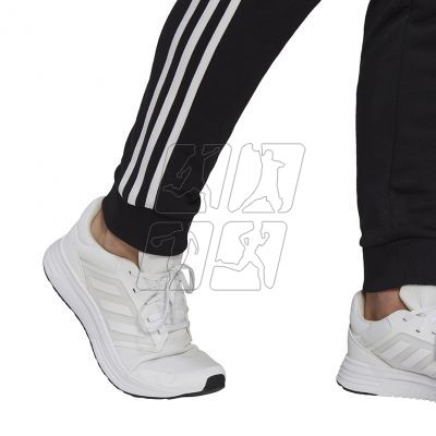 5. Spodnie adidas Essentials Tapered Cuff 3 Stripes M GK8831
