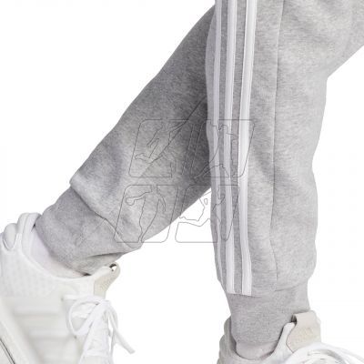 6. Spodnie adidas Essentials Fleece 3-Stripes Tapered Cuff M IJ6494