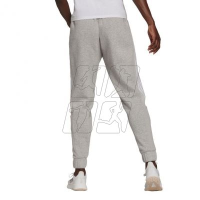 4. Spodnie adidas Essentials Colorblock Block Cut 3-Stripes Regular Tapered Pants W HB2768